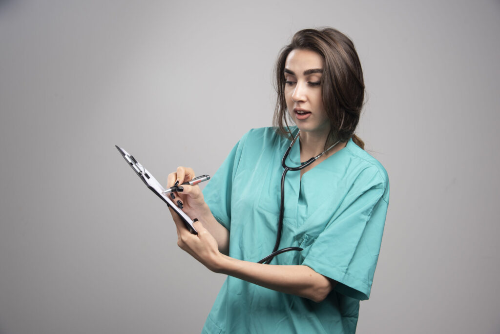 Female nurse holding a form