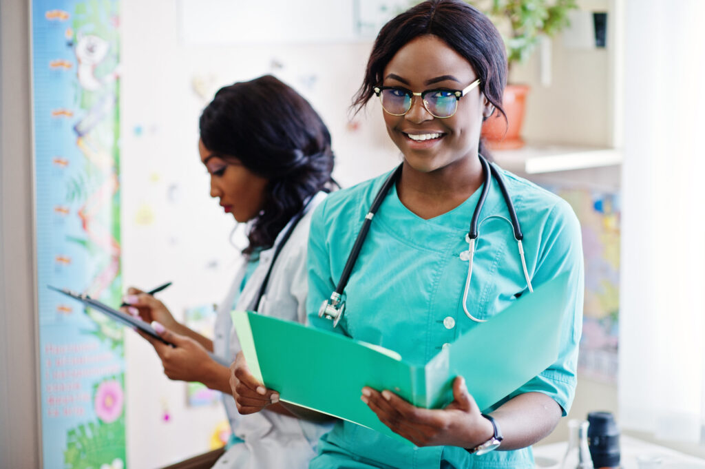 Two african american pharmacist working at hospital